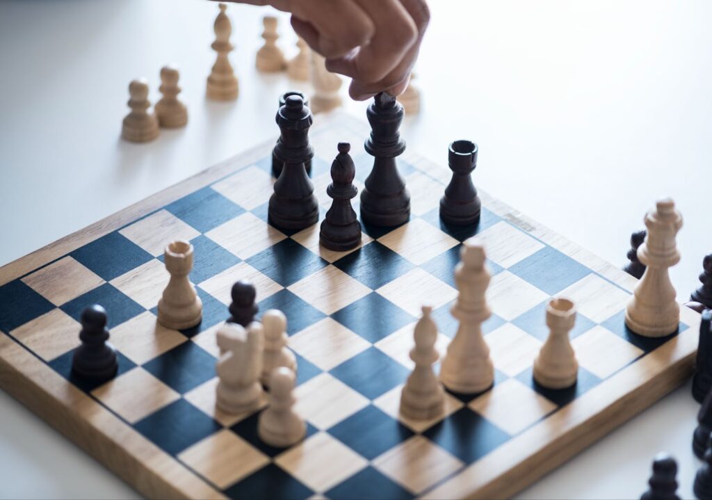 Close up of person play chess