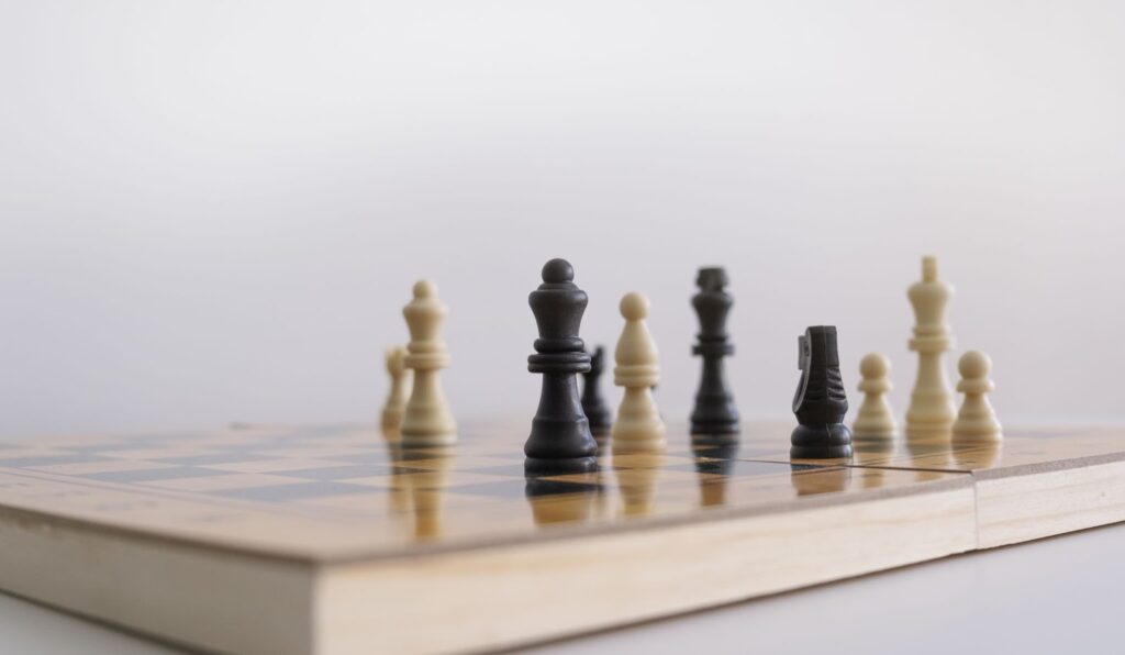 Closeup shot of chess figurines on a chessboard