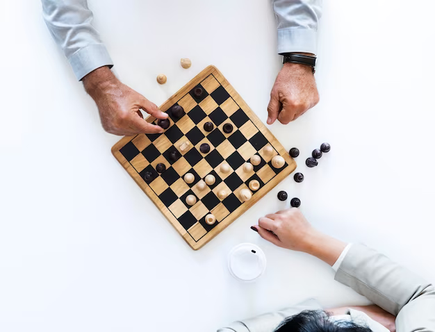 People playing chess, top view